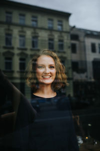Portrait of smiling young woman