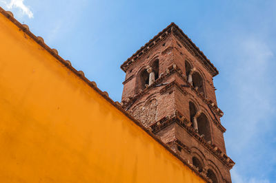 Low angle view of historic building against sky