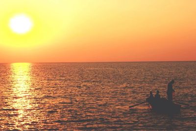 Scenic view of sea at sunset