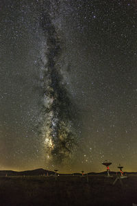 Scenic view of star field against sky at night