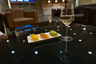 High angle view of wine in glass on table