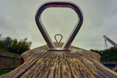 Low angle view of metallic structure against sky