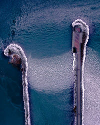 Aerial view of swimming pool in sea