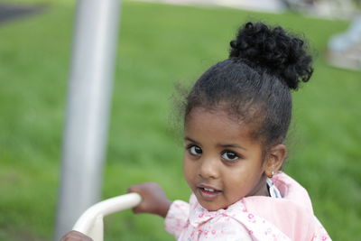 Portrait of cute girl outdoors