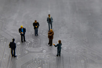 High angle view of people walking in rain