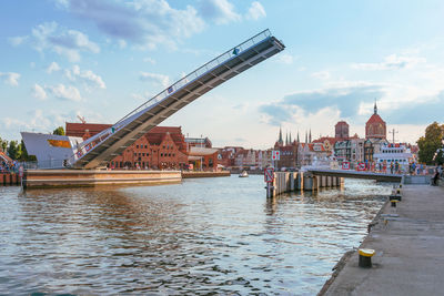 Footbridge in gdansk, poland. view on bascule bridge and on the old town