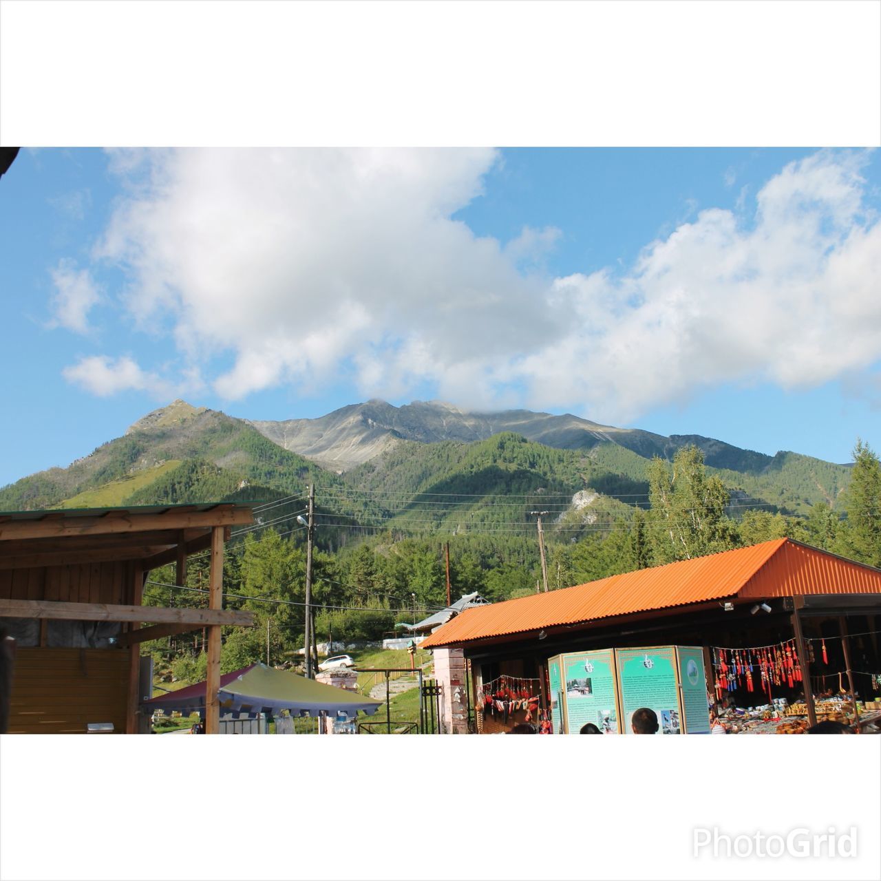 mountain, sky, built structure, transfer print, architecture, building exterior, house, mountain range, cloud - sky, cloud, landscape, auto post production filter, day, nature, scenics, tranquil scene, tranquility, outdoors, residential structure