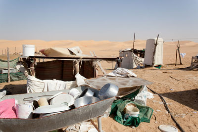 Desert clothes on clothesline against sky