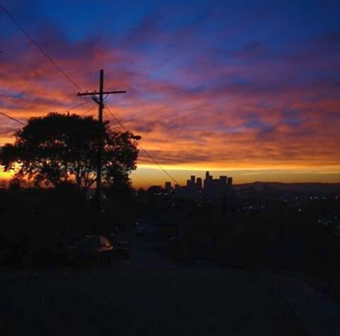 SILHOUETTE OF CITY AT SUNSET