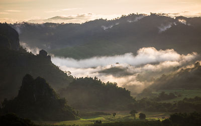 Scenic view of mountains against sky during sunset