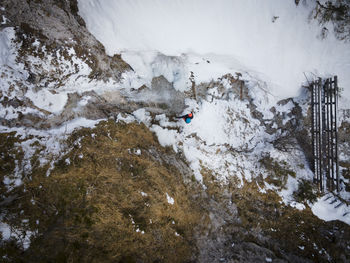 High angle view of people on snowcapped mountain