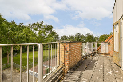 Bridge over road against sky