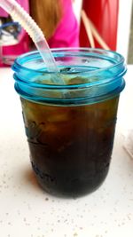 Close-up of drink in jar on table