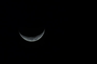 Close-up of moon against clear sky at night