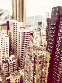 High angle view of buildings in city against sky