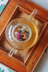 High angle view of hot tea in glass on table