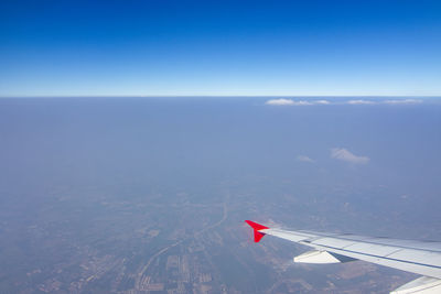 Airplane flying in sky