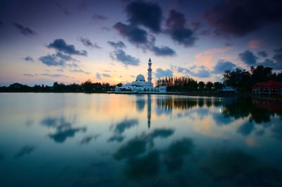 Scenic view of lake against sky during sunset