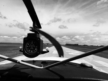 Close-up of airplane against sky