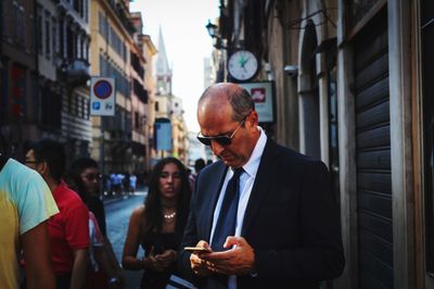 People on street in city