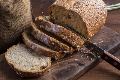 High angle view of bread on cutting board