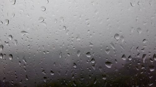 Close-up of water drops on glass