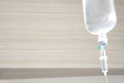 Close up of iv drip against wall