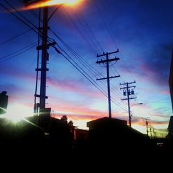 Low angle view of electricity pylon