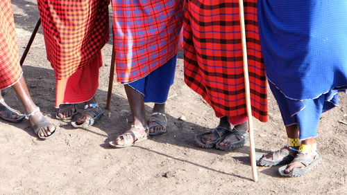 Low section of people standing on ground