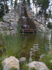 View of rocks in lake