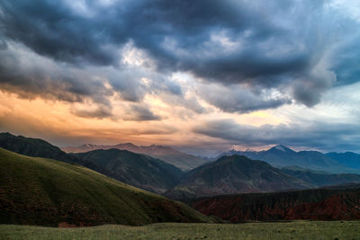 Scenic view of landscape against sky during sunset