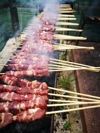 Close-up of meat on barbecue grill