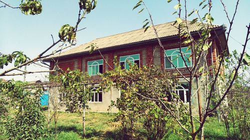 Low angle view of house against clear sky