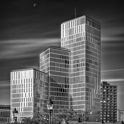 Low angle view of modern buildings against sky