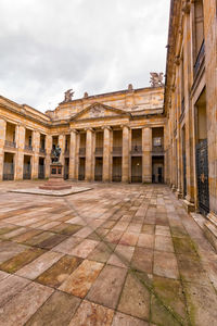 View of historical building against cloudy sky