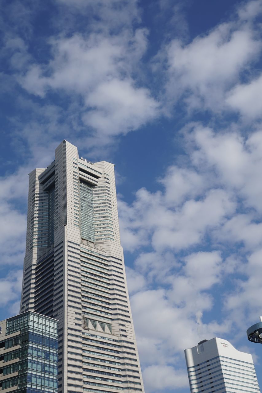 building exterior, architecture, built structure, building, cloud - sky, low angle view, sky, office building exterior, city, tall - high, office, skyscraper, tower, modern, nature, day, no people, outdoors, residential district, travel destinations, financial district