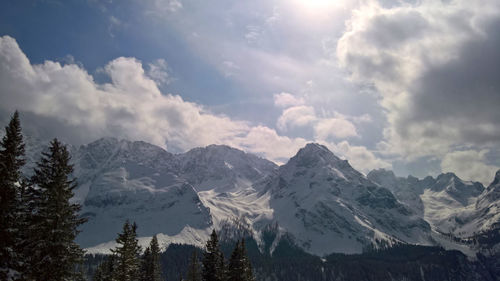 Scenic view of snowcapped mountains against sky