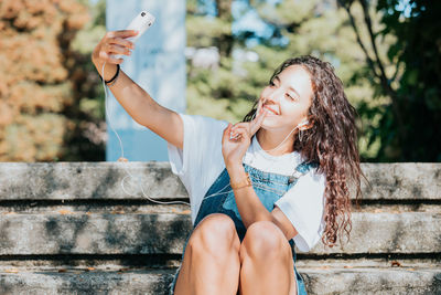 Young woman using mobile phone