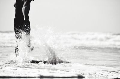 Woman standing on beach