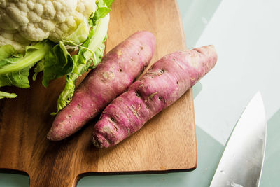 High angle view of vegetables on cutting board