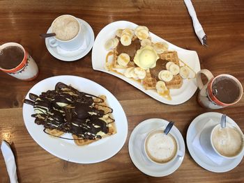 High angle view of breakfast served on table