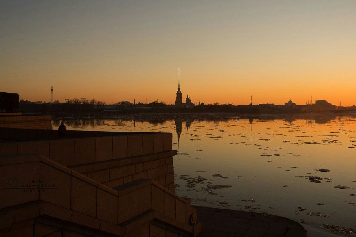 sunset, water, clear sky, copy space, reflection, orange color, scenics, tranquil scene, tranquility, silhouette, built structure, beauty in nature, nature, lake, architecture, transportation, sea, river, idyllic, outdoors