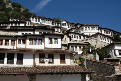 Traditional ottoman houses in old town berat known as the white city of albania