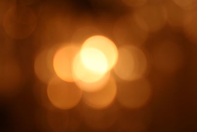 Close-up of illuminated lights at night