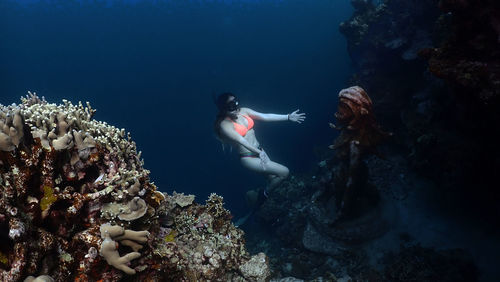 Man swimming in sea