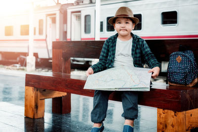 Portrait of boy standing outdoors