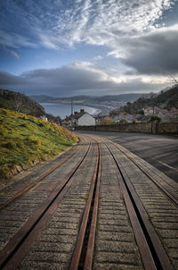 Railroad tracks against sky