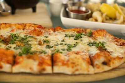 Close-up of pizza served in plate