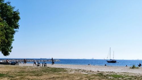 Scenic view of beach against clear sky