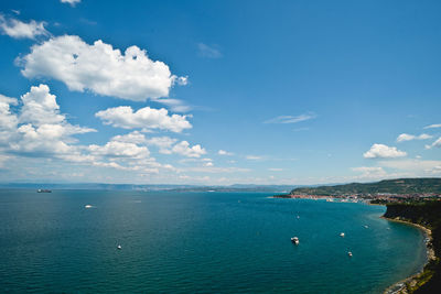 Scenic view of sea against blue sky